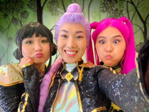 K-pop party idols posing for a selfie